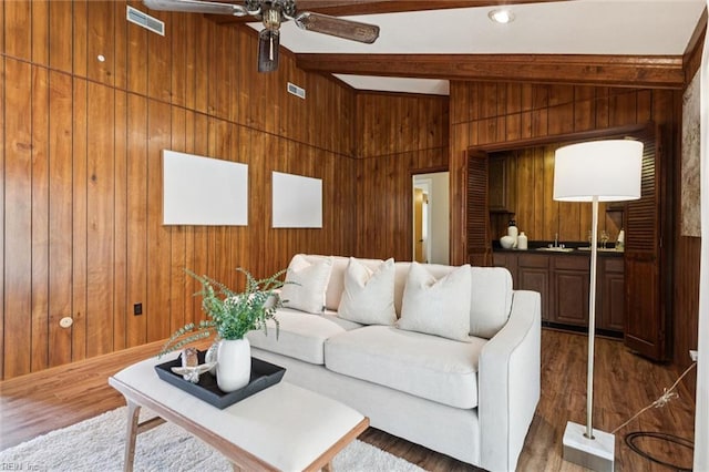 2438 Blue Castle Ct, Virginia Beach, VA 23454 - living room with wood walls, ceiling fan, and wood finished floors