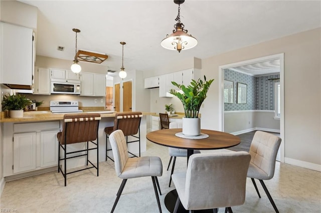 2438 Blue Castle Ct, Virginia Beach, VA 23454 - dining space with baseboards and wallpapered walls