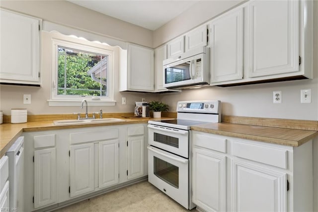 2438 Blue Castle Ct, Virginia Beach, VA 23454 - kitchen featuring white appliances, a sink, light countertops, and white cabinetry