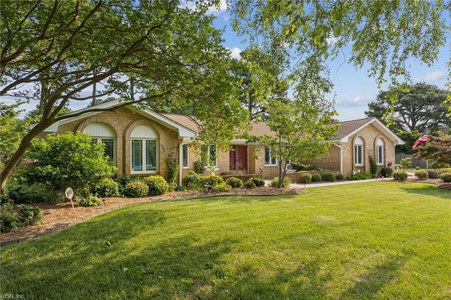 2438 Blue Castle Ct, Virginia Beach, VA 23454 - ranch-style home featuring a front lawn and brick siding
