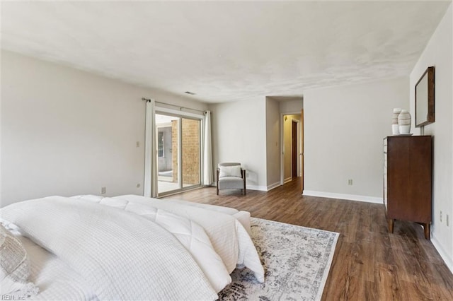 2438 Blue Castle Ct, Virginia Beach, VA 23454 - bedroom with dark wood-style flooring and baseboards