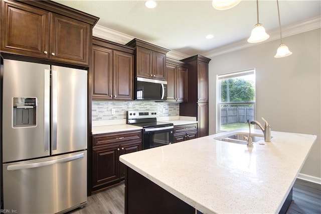 1808 Princeton Ave, Norfolk, VA 23523 - kitchen featuring appliances with stainless steel finishes, a sink, ornamental molding, dark wood finished floors, and tasteful backsplash