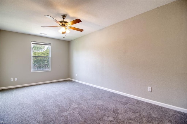 1808 Princeton Ave, Norfolk, VA 23523 - spare room featuring dark carpet, baseboards, and ceiling fan