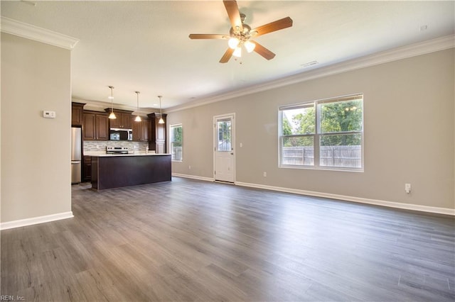1808 Princeton Ave, Norfolk, VA 23523 - unfurnished living room with crown molding, ceiling fan, dark wood finished floors, and baseboards