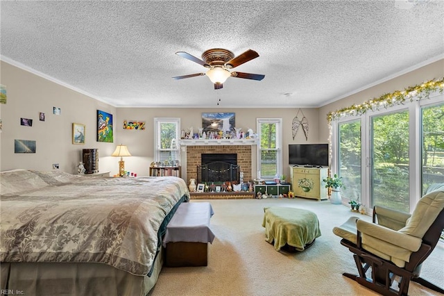 6372 Colby Way, Virginia Beach, VA 23464 - bedroom featuring ornamental molding, a textured ceiling, carpet floors, a fireplace, and a ceiling fan