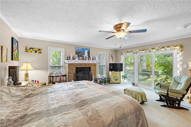 6372 Colby Way, Virginia Beach, VA 23464 - bedroom featuring carpet floors, access to exterior, ornamental molding, multiple windows, and a fireplace