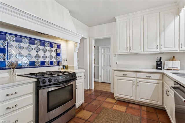 4002 Chesapeake Ave, Hampton, VA 23669 - kitchen with appliances with stainless steel finishes, decorative backsplash, white cabinets, and light countertops