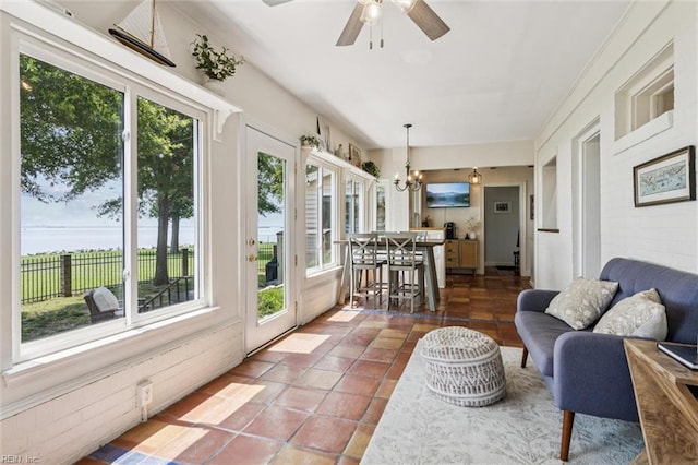 4002 Chesapeake Ave, Hampton, VA 23669 - sunroom with plenty of natural light, a chandelier, and a water view