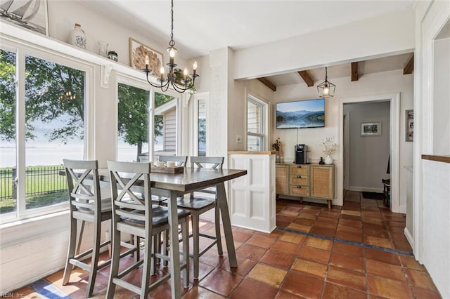 4002 Chesapeake Ave, Hampton, VA 23669 - dining room with healthy amount of natural light, beam ceiling, and a chandelier