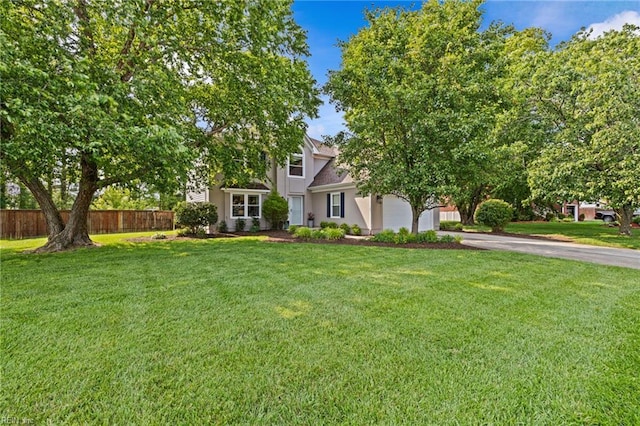 2753 Elson Green Ave, Virginia Beach, VA 23456 - view of property hidden behind natural elements with driveway and stucco siding