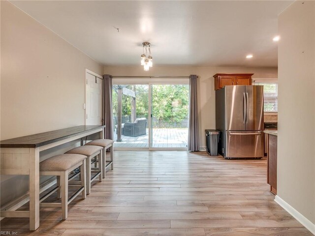 1803 Revere Dr, Hampton, VA 23664 - dining space with light wood-style flooring, recessed lighting, and baseboards