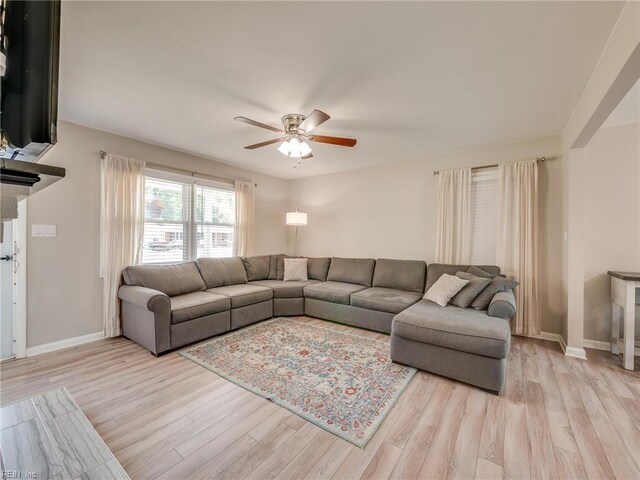 1803 Revere Dr, Hampton, VA 23664 - living room featuring ceiling fan, light wood-style floors, and baseboards