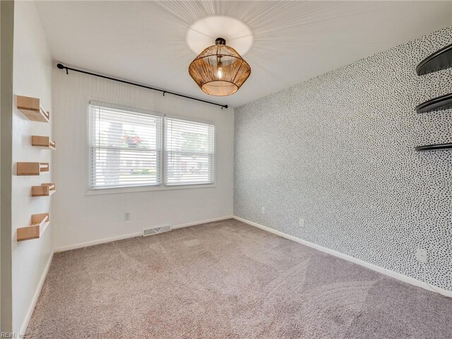 1803 Revere Dr, Hampton, VA 23664 - spare room featuring carpet floors and baseboards