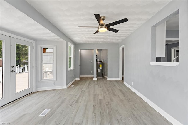 1020 Philpotts Rd, Norfolk, VA 23513 - unfurnished sunroom with water heater and french doors