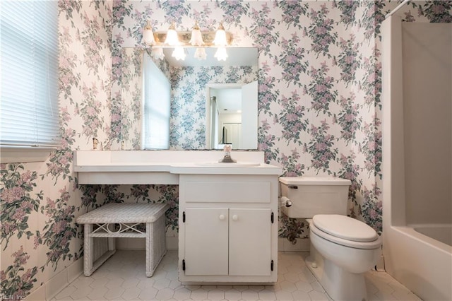 7006 Atlantic Ave, Virginia Beach, VA 23451 - full bath with wallpapered walls, toilet, vanity, and tile patterned floors