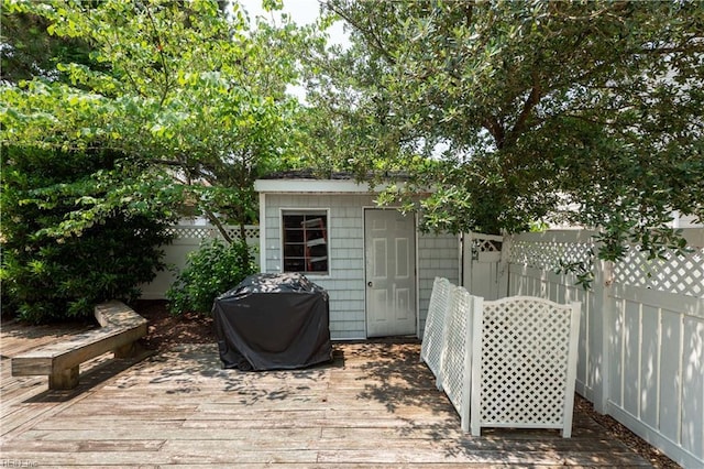 7006 Atlantic Ave, Virginia Beach, VA 23451 - wooden terrace featuring a fenced backyard and grilling area