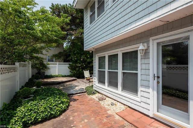 7006 Atlantic Ave, Virginia Beach, VA 23451 - fenced backyard with a patio