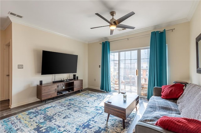 1400 Granby St Unit 413, Norfolk, VA 23510 - living area featuring crown molding, ceiling fan, wood finished floors, and baseboards