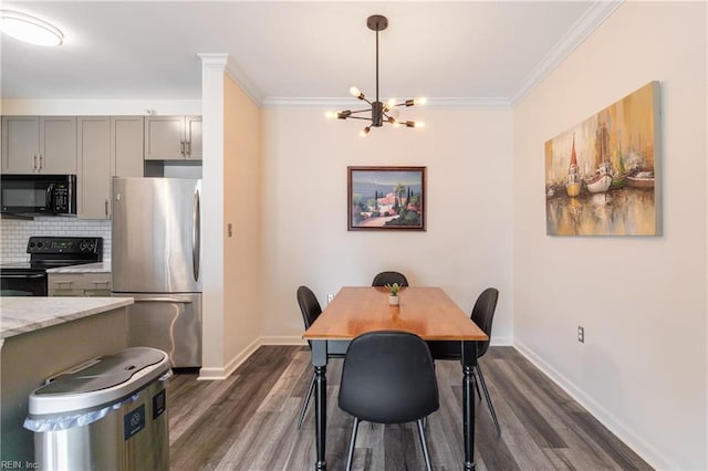 1400 Granby St Unit 413, Norfolk, VA 23510 - dining area featuring dark wood-style flooring, a chandelier, baseboards, and crown molding