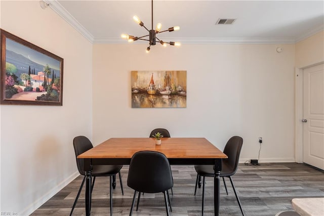 1400 Granby St Unit 413, Norfolk, VA 23510 - dining space with a chandelier, baseboards, wood finished floors, and crown molding