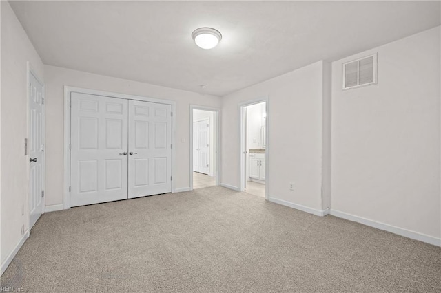 208 56th St Unit B, Virginia Beach, VA 23451 - unfurnished bedroom with carpet floors, baseboards, and a closet