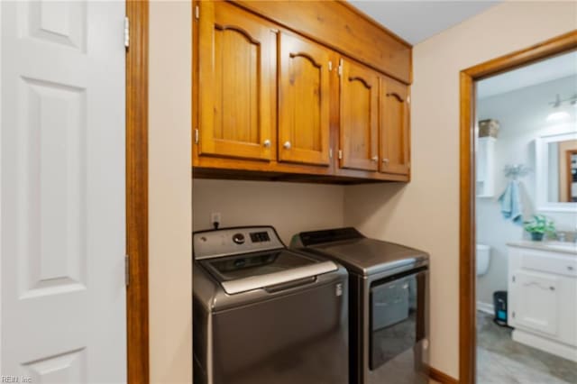 4712 Condor Dr, Chesapeake, VA 23321 - washroom featuring independent washer and dryer and cabinet space
