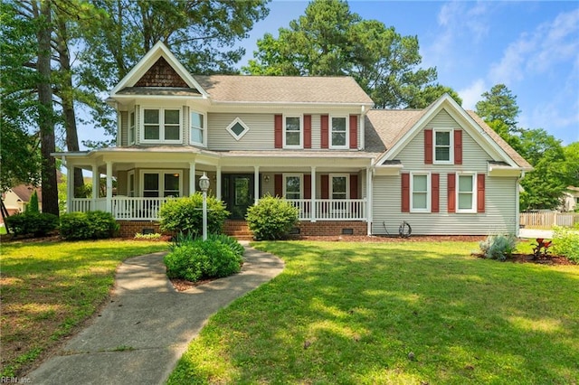 4712 Condor Dr, Chesapeake, VA 23321 - victorian-style house with a porch, a front lawn, and crawl space