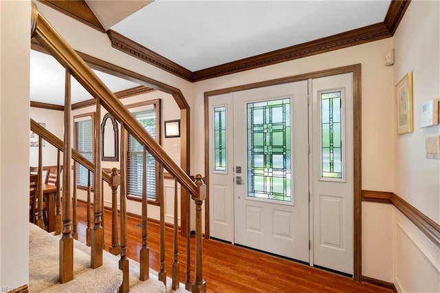 4712 Condor Dr, Chesapeake, VA 23321 - entrance foyer featuring wood finished floors, crown molding, and stairway
