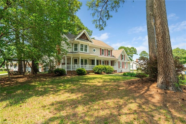 4712 Condor Dr, Chesapeake, VA 23321 - back of house featuring a porch and a lawn