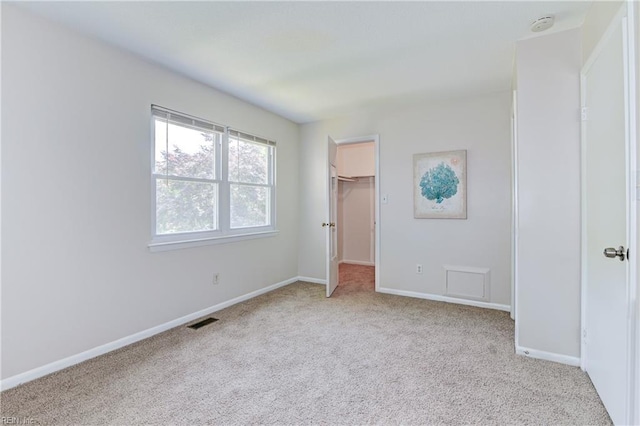 785 Biltmore Dr, Virginia Beach, VA 23454 - unfurnished bedroom with carpet floors, baseboards, a walk in closet, and a closet