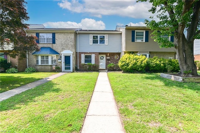 785 Biltmore Dr, Virginia Beach, VA 23454 - view of property with brick siding and a front lawn