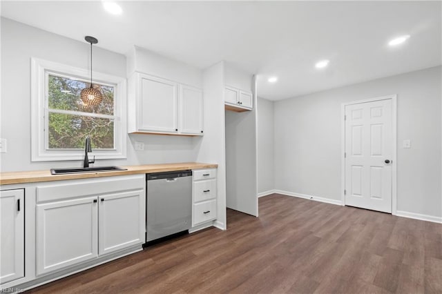 313 Delk St, Franklin, VA 23851 - kitchen featuring dishwasher, a sink, butcher block counters, dark wood-type flooring, and recessed lighting