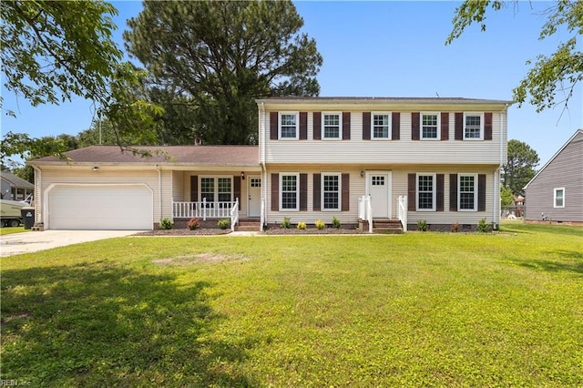 304 Odd Rd, Poquoson, VA 23662 - colonial inspired home featuring an attached garage, driveway, a front yard, a porch, and crawl space