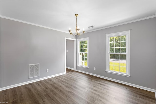 304 Odd Rd, Poquoson, VA 23662 - spare room featuring a chandelier, dark wood-type flooring, baseboards, and crown molding
