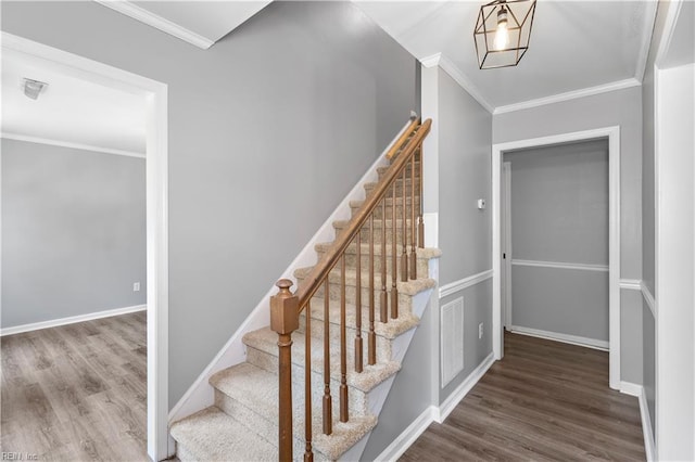 304 Odd Rd, Poquoson, VA 23662 - staircase featuring wood finished floors, ornamental molding, and baseboards
