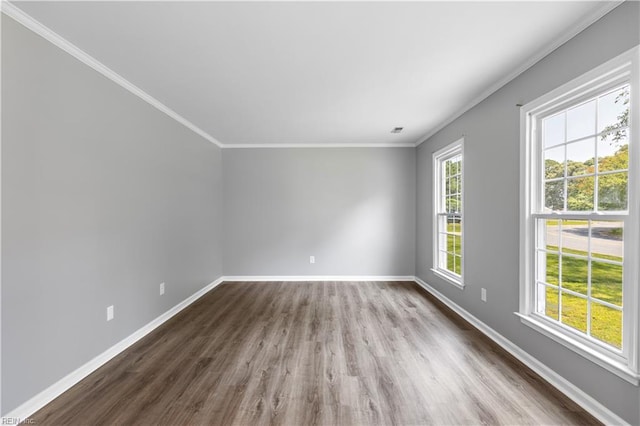 304 Odd Rd, Poquoson, VA 23662 - empty room featuring crown molding, dark wood-style floors, and baseboards