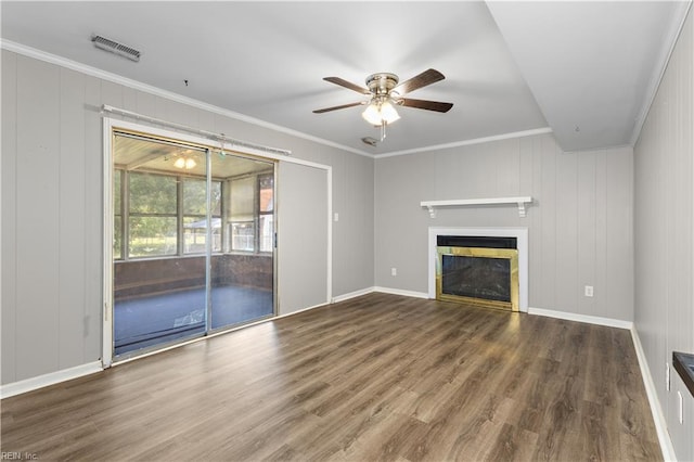 304 Odd Rd, Poquoson, VA 23662 - unfurnished living room with ceiling fan, crown molding, wood finished floors, a glass covered fireplace, and baseboards