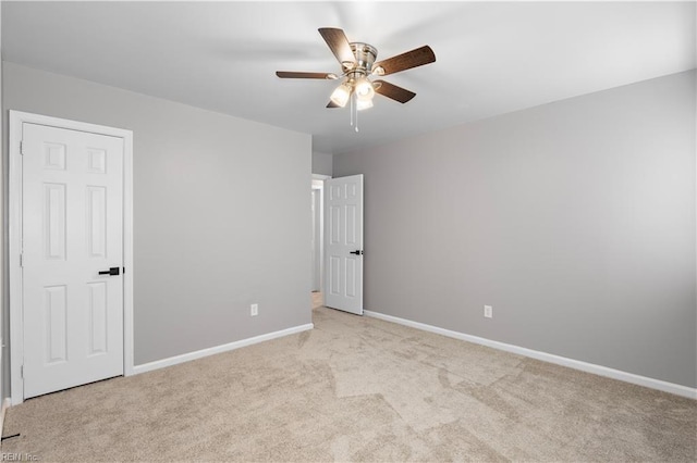 304 Odd Rd, Poquoson, VA 23662 - empty room with a ceiling fan, light carpet, and baseboards