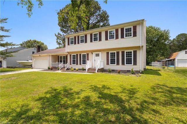 304 Odd Rd, Poquoson, VA 23662 - colonial inspired home featuring an attached garage, driveway, and crawl space