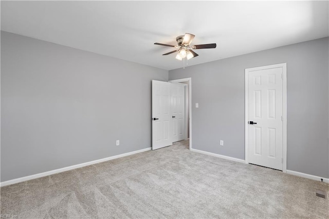 304 Odd Rd, Poquoson, VA 23662 - unfurnished bedroom featuring carpet, baseboards, and ceiling fan