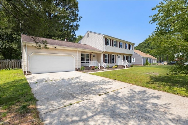 304 Odd Rd, Poquoson, VA 23662 - colonial inspired home featuring an attached garage and driveway