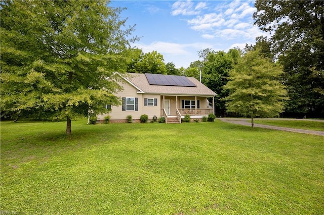 21187 Rescue Rd, Carrollton, VA 23314 - single story home with a porch, solar panels, and a front yard