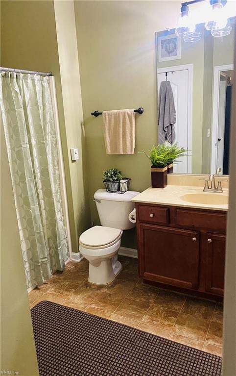 5201 Nuthall Dr Unit 204, Virginia Beach, VA 23455 - full bathroom featuring toilet, vanity, a chandelier, and tile patterned flooring