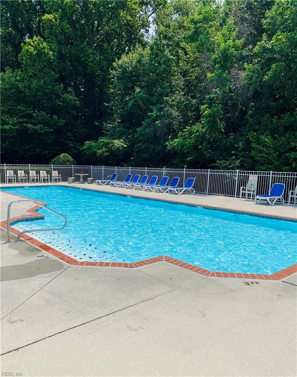 5201 Nuthall Dr Unit 204, Virginia Beach, VA 23455 - community pool featuring a patio area