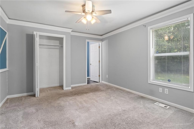 14 N Walker Rd, Hampton, VA 23666 - unfurnished bedroom featuring carpet, baseboards, crown molding, a closet, and ceiling fan