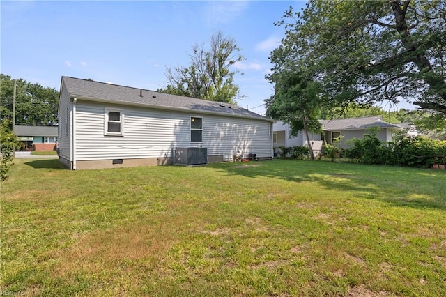14 N Walker Rd, Hampton, VA 23666 - rear view of house with a yard and cooling unit