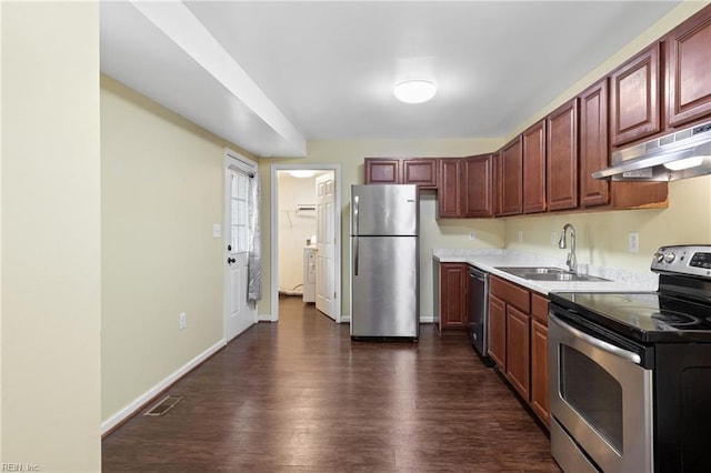 14 N Walker Rd, Hampton, VA 23666 - kitchen featuring appliances with stainless steel finishes, a sink, under cabinet range hood, dark wood finished floors, and baseboards