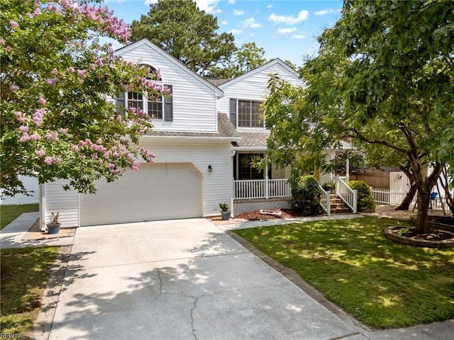 1216 New Born Ct, Chesapeake, VA 23322 - traditional-style house featuring an attached garage, concrete driveway, a porch, and roof with shingles