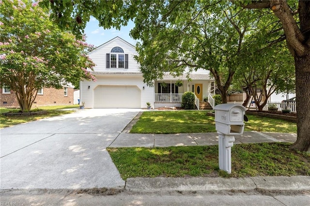 1216 New Born Ct, Chesapeake, VA 23322 - view of front of house with concrete driveway, a porch, a garage, and a front yard