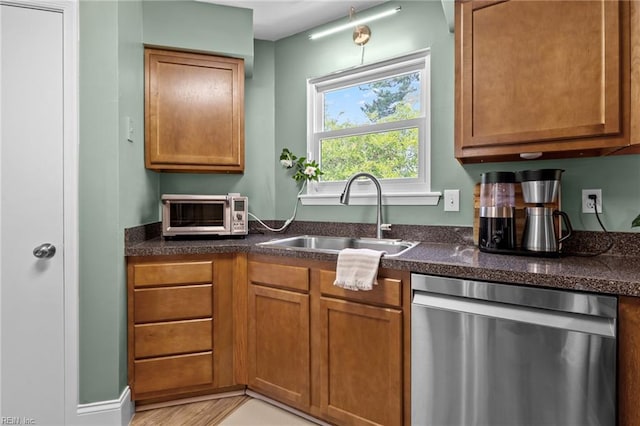 1216 New Born Ct, Chesapeake, VA 23322 - kitchen with dishwasher, a sink, and brown cabinets